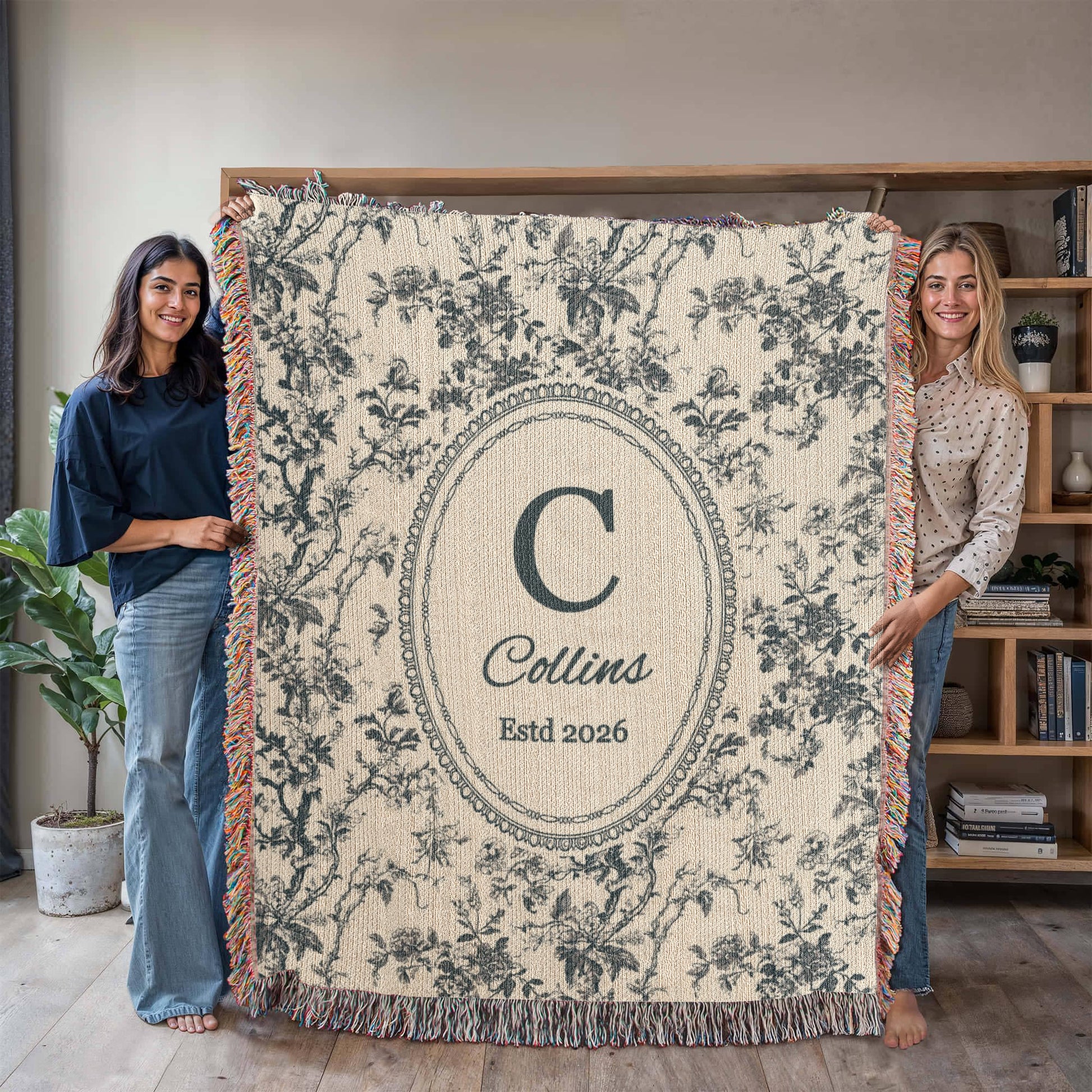 Personalized blue toile woven blanket with family initial, name, and established date
