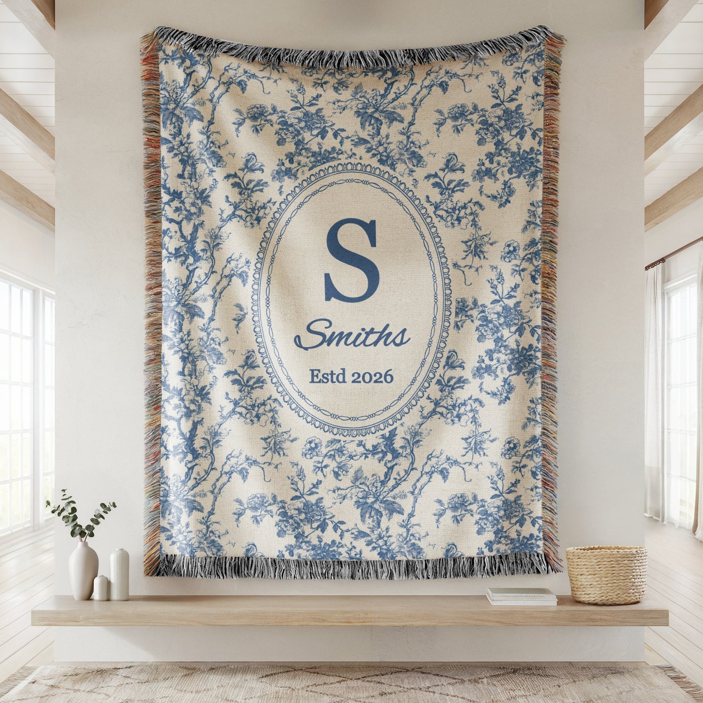 Personalized blue toile woven blanket with family initial, name, and established date