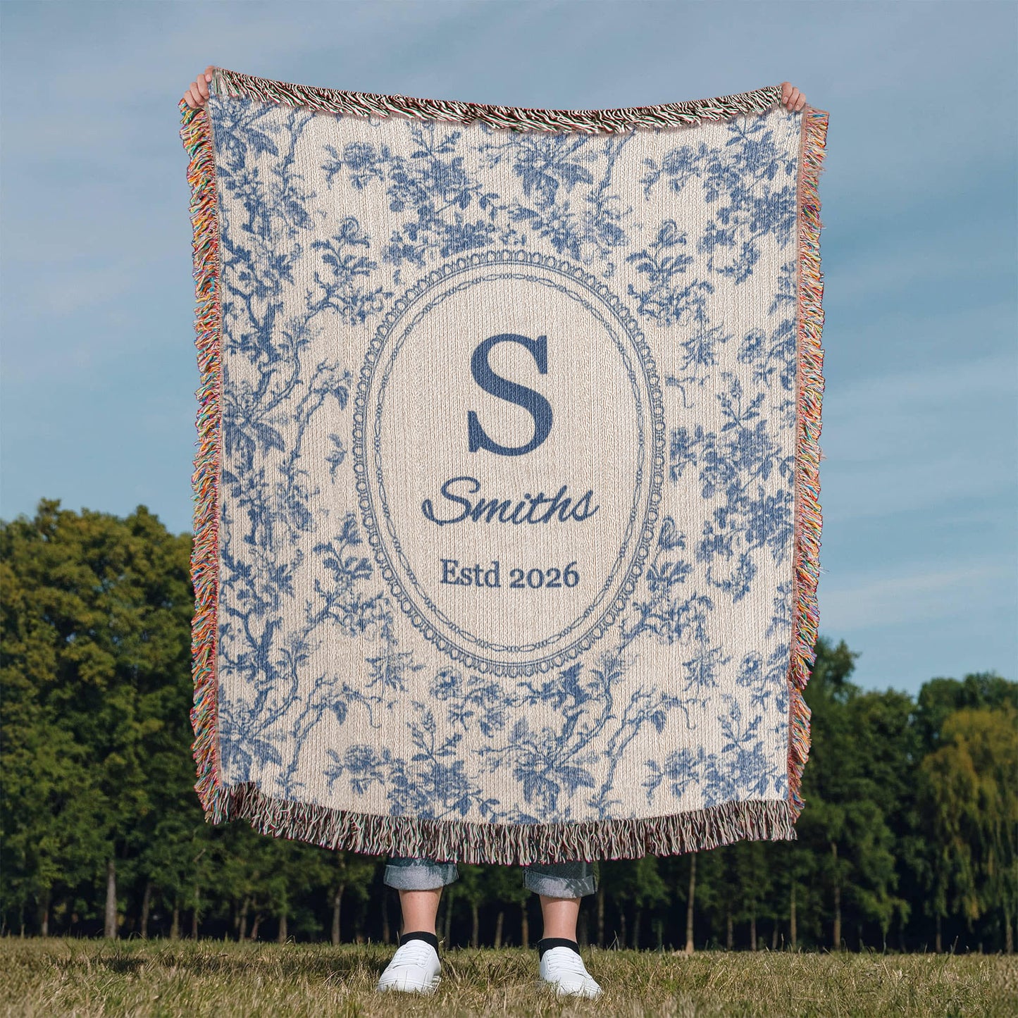 Monogram family name throw blanket in an elegant French blue toile design